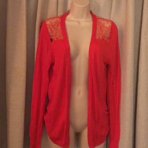 Coral colored decorative cardigan